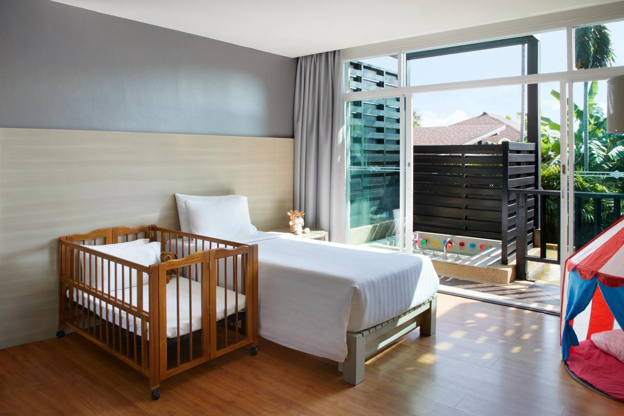 Pullman Phuket Panwa Beach Resort Camera foto A cot in a hotel room